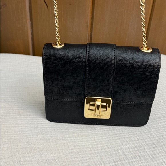 Kate Spade New York Phoebe Turnlock Mini Flap Crossbody Bag
Originally $320 - Picture 7 of 12